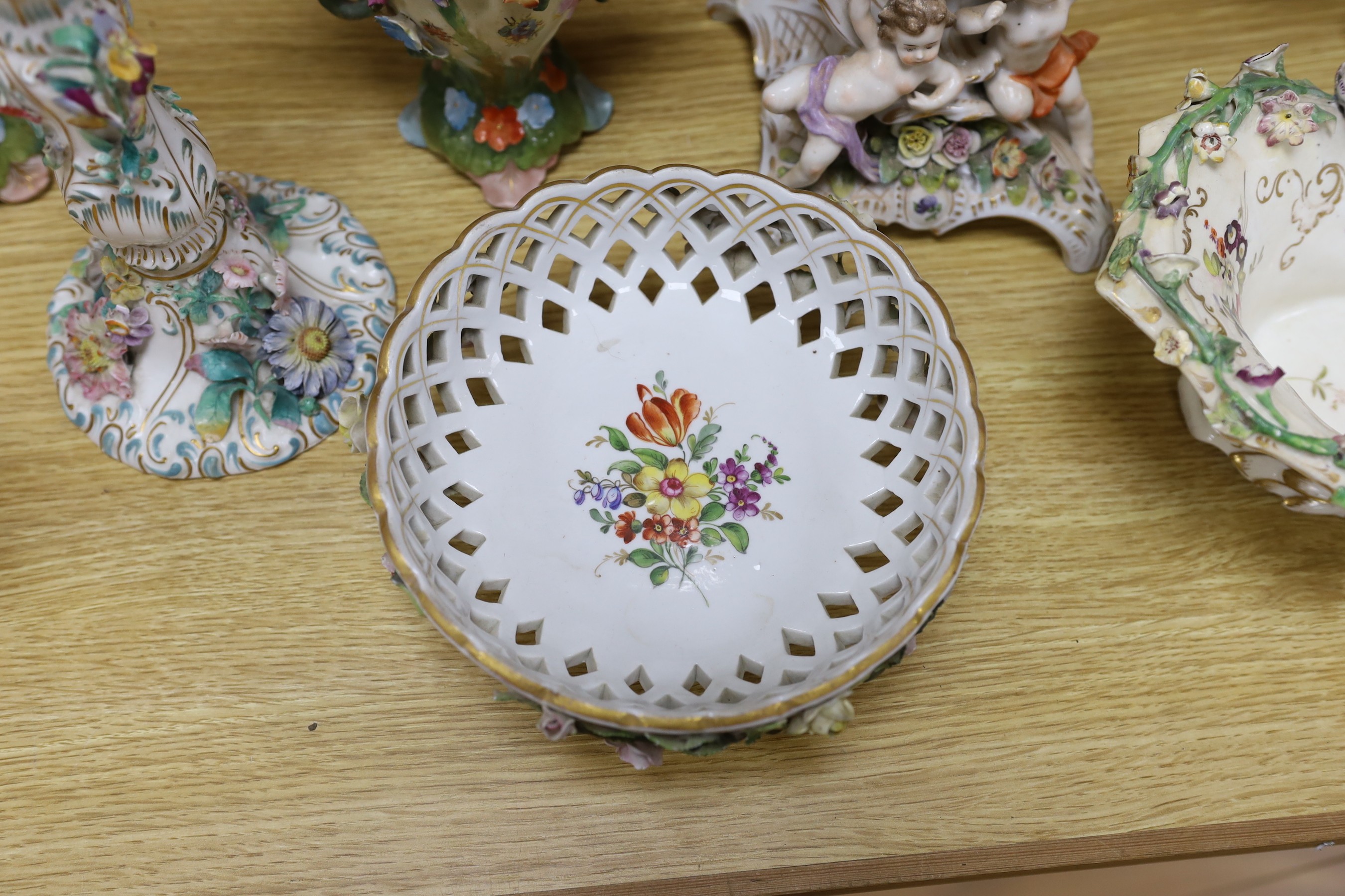 A group of 19th century and later continental floral encrusted porcelain items